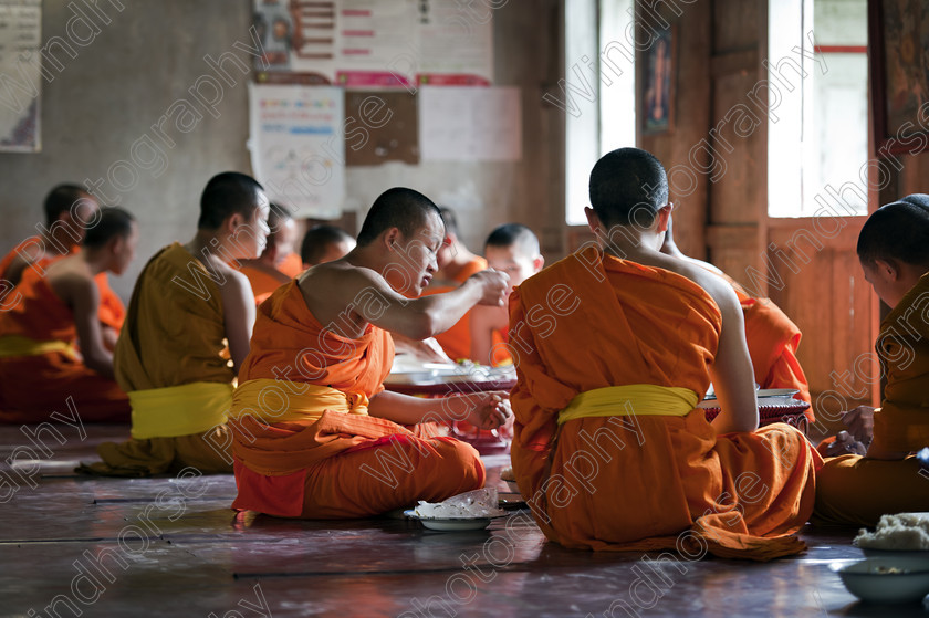 Alms 20 
 Keywords: Laos, alms, Buddhist, monks, Luang Prabang, eating, religeous, religion