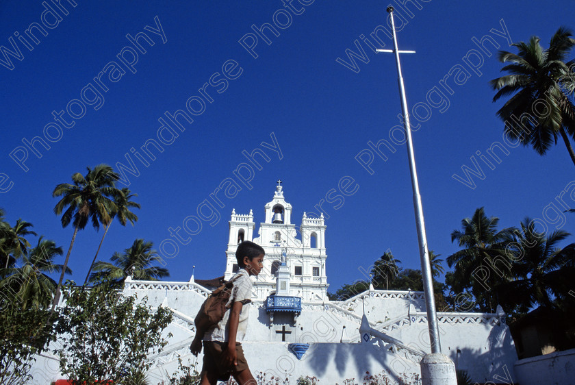 Immaculate Conception 
 A school boy walks past the Church of the Immaculate Conception in Panjim, Goa, India. 
 Keywords: Panjim, Goa, India, Panaji, Church, immaculate, Conception, School, boy