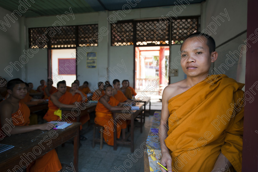 Monks School VT 11 
 A monk English teacher & his pupils, Vientiane, Laos. 
 Keywords: Vientiane, Laos, lessons, Buddhist, monks, monastery, English, classroom, teacher, pupils